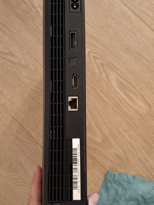 PlayStation 3 Slim console bundle with controllers and games