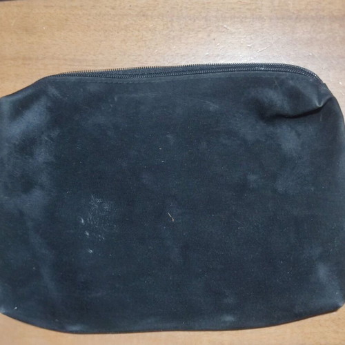 Velvet black handbag used with zipper and metal ring
