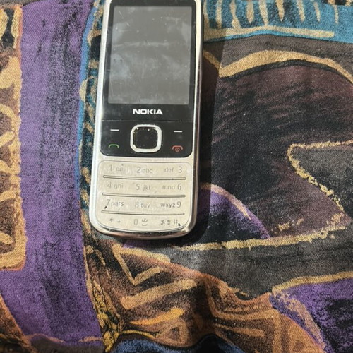 Nokia 6700c-1 used, English menu, no charger, gray