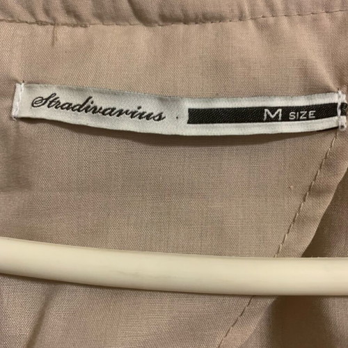 Stradivarius beige blouse with zipper like new, size M