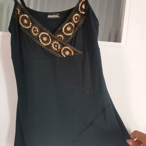 Spaghetti strap top used, black with gold embroidery, size small