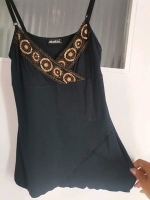 Spaghetti strap top used, black with gold embroidery, size small