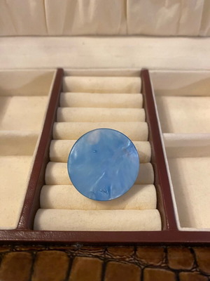 Ring with blue stone adjustable size like new