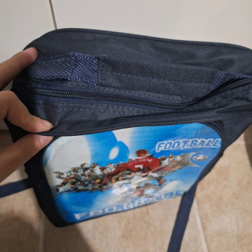 School bag football with central and side compartments