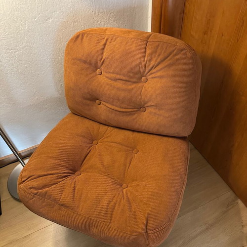 Modern swivel armchair, terracotta fabric and metal