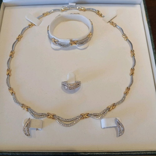Fa Cad'oro jewelry set like new, gold and white gold with zircon stones