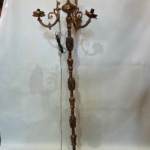 Vintage brass floor lamp with ornate baroque designs used