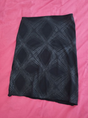 Evening skirt above the knee like new, black with silver pattern, size L