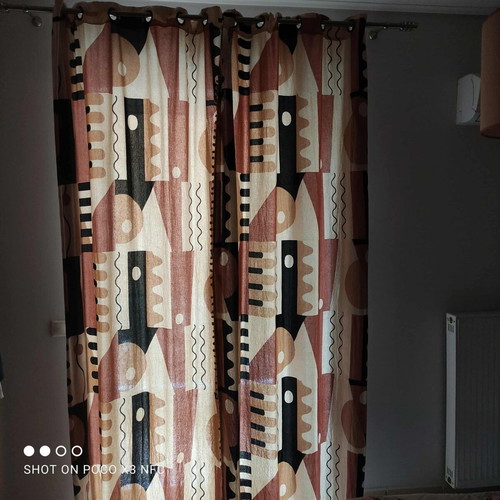 Curtains with grommets like new, two panels 1.40x2.60m each, medium shading