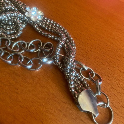 Metal belt like new, silver with bow and rhinestones