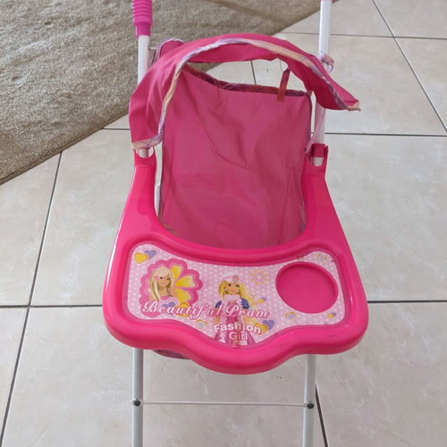 Doll stroller used with wear and fabric tears
