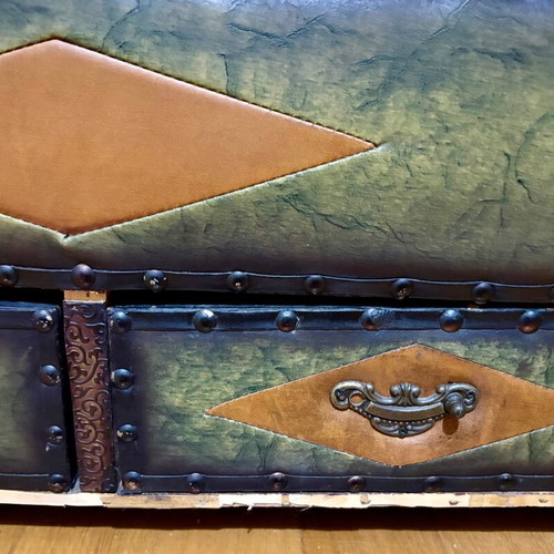 Vintage large chest with green upholstery and metal details