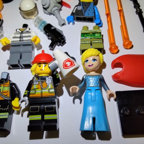 Lego figures, accessories and pieces used, all together