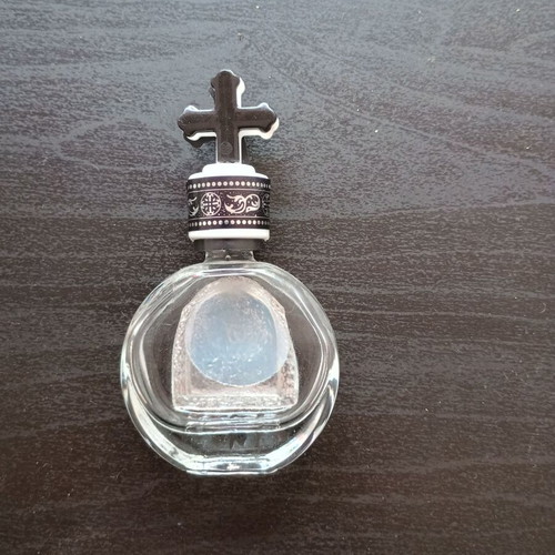 Small holy water bottle used