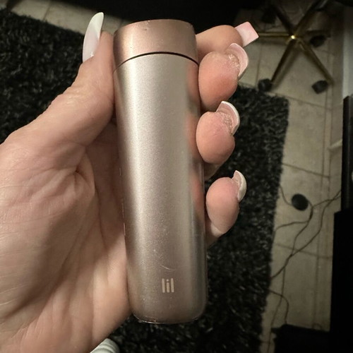 Solid IQOS device used with wear