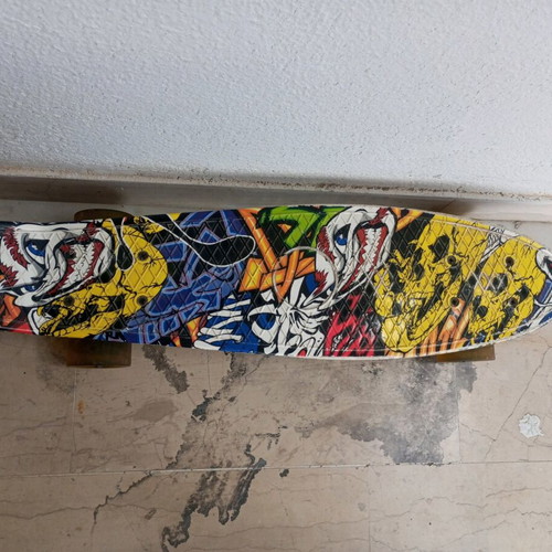Penny Board skateboard like new with crazy graphics