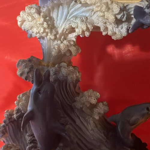Clock used with dolphins around