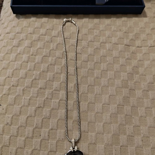 Swarovski pendant with purple heart like new
