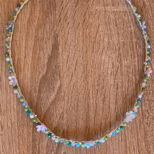 Handmade wire crown with colorful beads and flower details