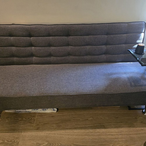 Three-seater sofa bed, dark grey, with gifts