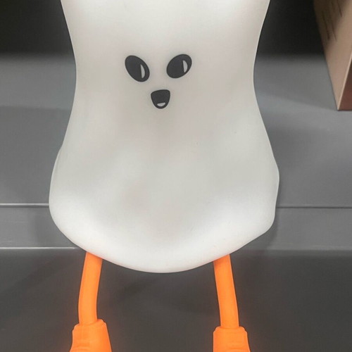 Silicone ghost night light with adjustable brightness and orange feet