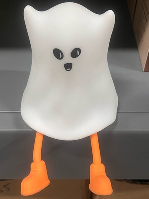 Silicone ghost night light with adjustable brightness and orange feet