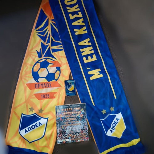 Apoel scarf, small book and lighter used