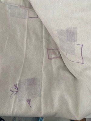 Pair of cream pink and purple curtains, printed design