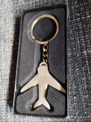 Airplane keychain new, silver