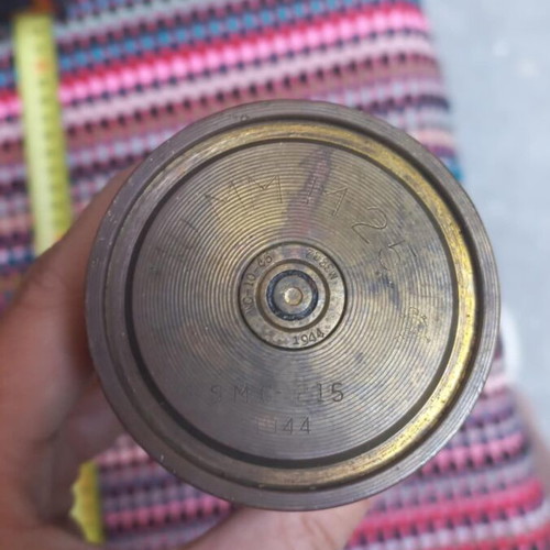 Brass shell used with AU MM M 25 SMC 215 1944 markings