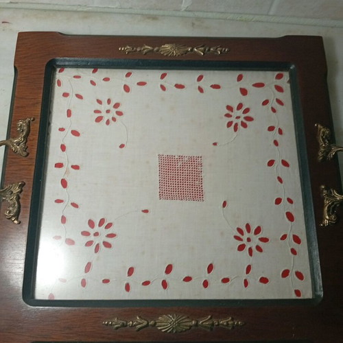 Traditional wooden serving tray used with handmade embroidery