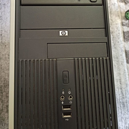 HP computer case used with power supply, RAM, processor, and DVD player