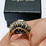Women's 18k gold ring with emerald and diamonds used