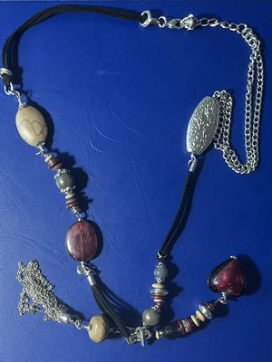 Long women's necklace with beads and decorative heart like new
