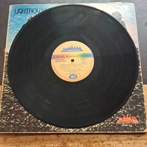 Lighthouse Sunny Days record used, good condition