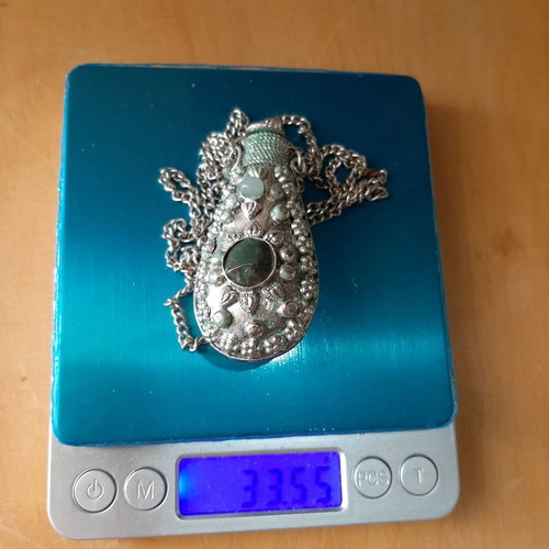 Vintage perfume bottle necklace used with filigree and semiprecious stones