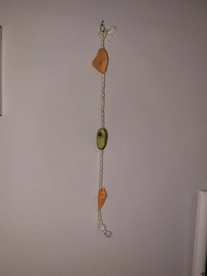 Handmade wall decoration with natural stones and shell, new