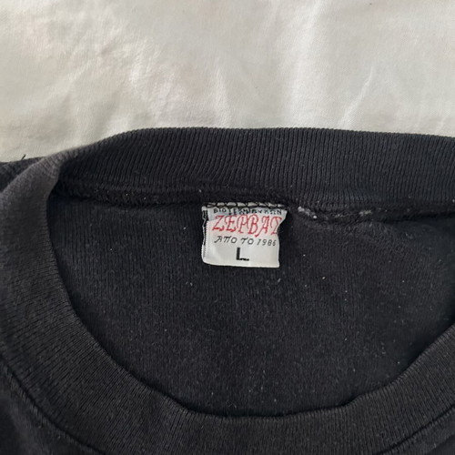 Black T-shirt size L used, fitted