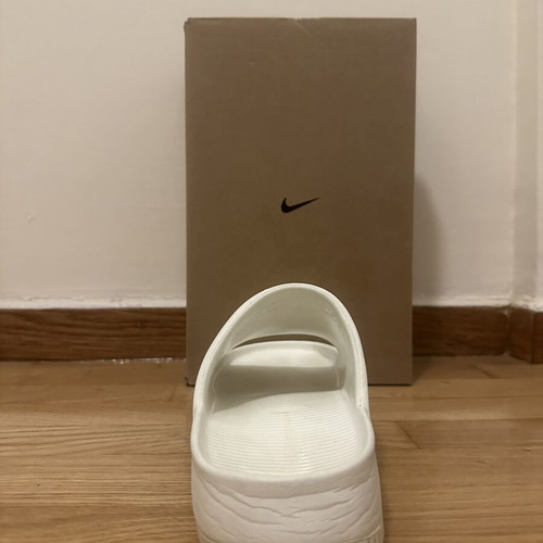 Nike men's white Calm slides size 42.5, used with signs of wear