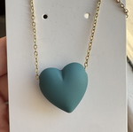 Necklace with petrol heart pendant