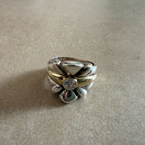 Silver and gold ring with diamond used