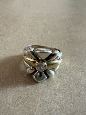 Silver and gold ring with diamond used