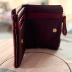 Carpisa wallet like new, burgundy with 6 card slots and coin zipper