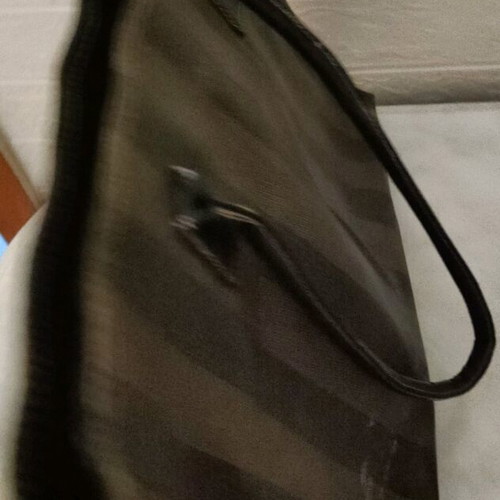 Handbag used with beige-brown stripes, plastic fabric