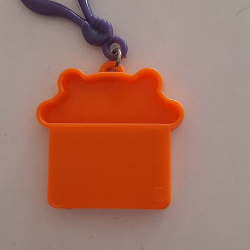 Vintage '80s games keychains with marbles like new