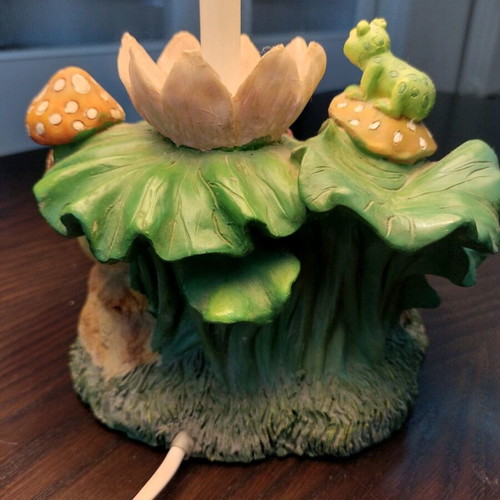 Table lamp used with decorative frog figurines