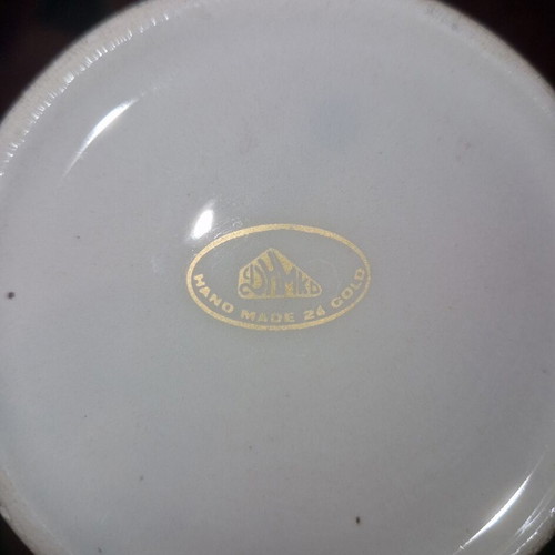 Handmade porcelain vase like new with gilded design