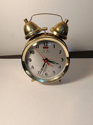 Five Rams table clock used, analog