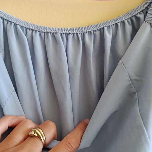 Dress with off-shoulder design light blue used, size M