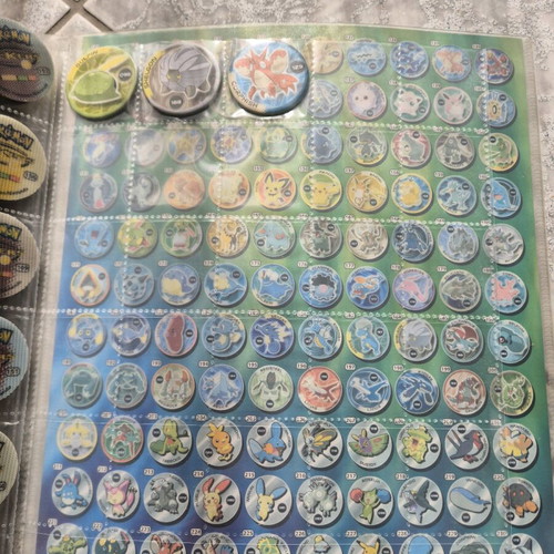 Pokemon collectible caps 213 pieces like new